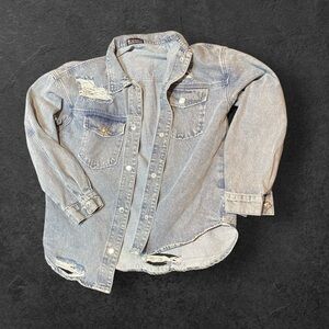 The tin cactus denim ripped jacket .